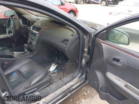 2012 Chevrolet Malibu LTZ z VIN 1G1ZG5E7XCF212629, wystawiony jako IAAI lot #43031213 z przebiegiem 194 958 mil mil oraz . Historia ofert i sprzedaży dostępna na DreamBid. Obrazek 5.