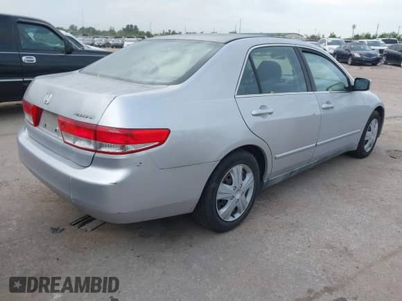 2003 Honda Accord LX z VIN 1HGCM66313A026547, wystawiony jako IAAI lot #42588097 z przebiegiem 237 568 mil mil oraz . Historia ofert i sprzedaży dostępna na DreamBid. Obrazek 4.