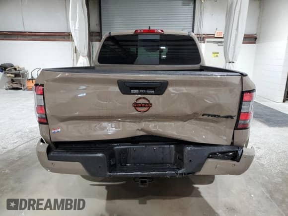 2023 Nissan Frontier SV with VIN 1N6ED1EK7PN660492, listed as a Copart auction lot 65771045 with 32,688 mi miles and Salvage title. Bid and sale history available at DreamBid. Image 6.