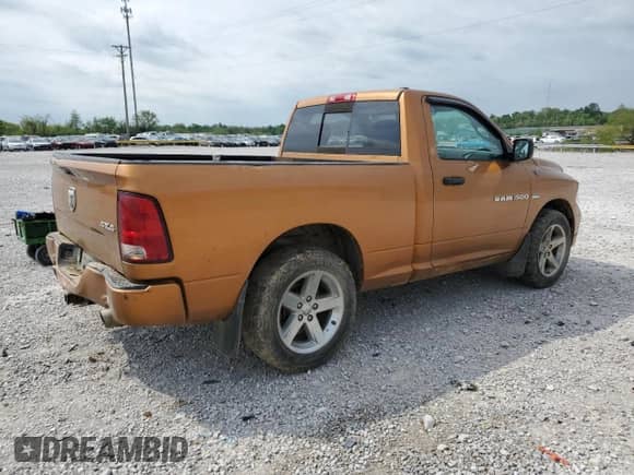 2012 Ram 1500 Express with VIN 3C6JD7AT7CG258016, listed as a Copart auction lot 53354615 with 111,134 mi miles and Salvage title. Bid and sale history available at DreamBid. Image 3.