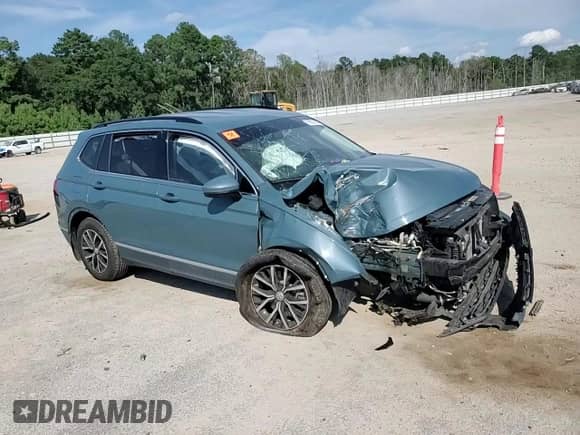 2021 Volkswagen Tiguan SE с VIN 3VV3B7AX8MM103795, выставлен на аукционе Copart как лот 69850945 с пробегом 74 585 миль миль и Списание • Salvage title. История ставок и продаж доступна на DreamBid. Изображение 14.