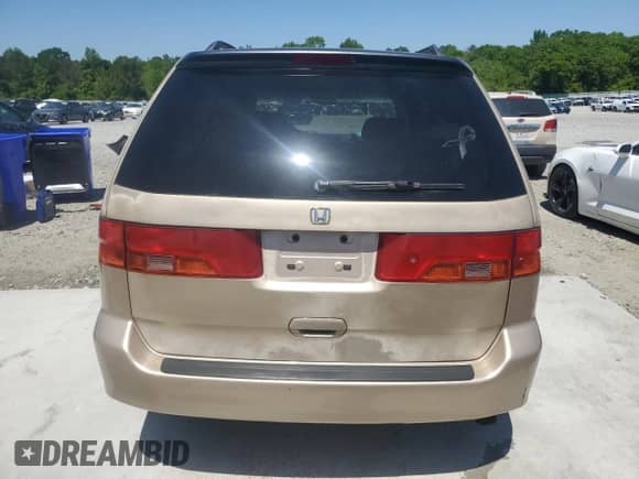2001 Honda Odyssey EX with VIN 2HKRL18651H552952, listed as a Copart auction lot 53447345 with 195,583 mi miles and Salvage title. Bid and sale history available at DreamBid. Image 6.