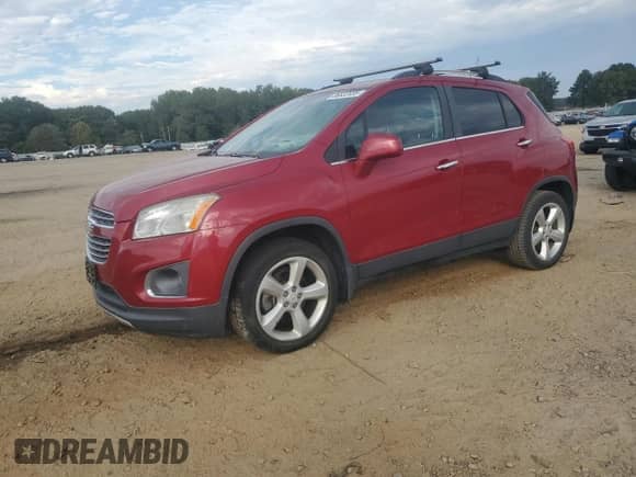 2015 Chevrolet Trax LTZ z VIN KL7CJTSB0FB199135, wystawiony jako Copart lot #86822035 z przebiegiem 76 454 mil mil oraz Czysty tytuł • Clean title. Historia ofert i sprzedaży dostępna na DreamBid. Obrazek 1.