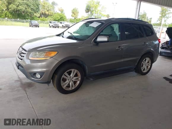 2011 Hyundai Santa Fe SE с VIN 5XYZHDAG1BG038711, выставлен на аукционе IAAI как лот 43118565 с пробегом 165 744 миль миль и . История ставок и продаж доступна на DreamBid. Изображение 18.