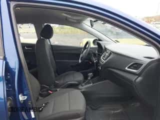 2021 Hyundai Accent SE z VIN 3KPC24A6XME148817, wystawiony jako IAAI lot #43014298 z przebiegiem 87 130 mil mil oraz . Historia ofert i sprzedaży dostępna na DreamBid. Obrazek 5.