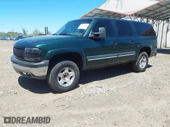 2003 Chevrolet Suburban LT z VIN 3GNEC16Z73G323056, wystawiony jako IAAI lot #42104085 z przebiegiem 253 484 mil mil oraz . Historia ofert i sprzedaży dostępna na DreamBid. Obrazek 17.