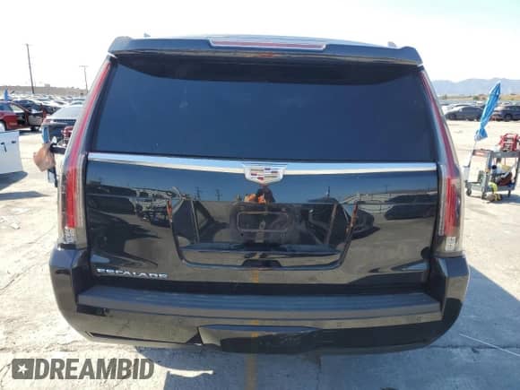 2020 Cadillac Escalade with VIN 1GYS4GKJ7LR270994, listed as a Copart auction lot 58999445 with 164,878 mi miles and Salvage title. Bid and sale history available at DreamBid. Image 6.