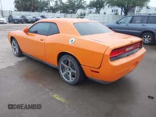 2012 Dodge Challenger SXT Plus with VIN 2C3CDYAG3CH137496, listed as a IAAI auction lot 43423079 with 194,196 mi miles and . Bid and sale history available at DreamBid. Image 3.