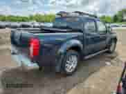 2010 Nissan Frontier Pro-4X with VIN 1N6AD0EV0AC407293, listed as a Copart auction lot 66124105 with 164,320 mi miles and Salvage title. Bid and sale history available at DreamBid. Image 3.