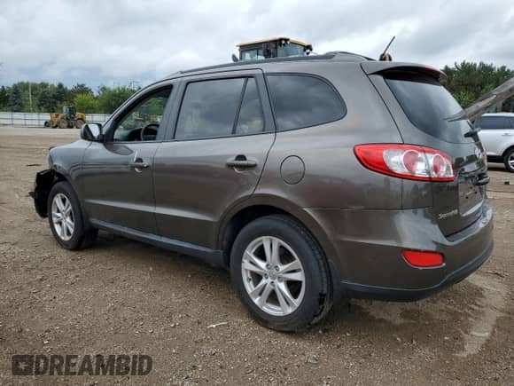 2012 Hyundai Santa Fe SE с VIN 5XYZHDAG9CG155048, выставлен на аукционе Copart как лот 71070065 с пробегом Не указан миль и Списание • Salvage title. История ставок и продаж доступна на DreamBid. Изображение 2.