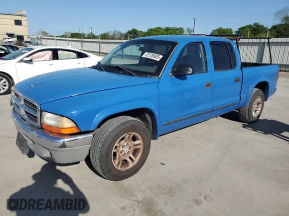 2002 Dodge Dakota SLT with VIN 1B7HL48N32S693817, listed as a Copart auction lot 52126605 with 238,782 mi miles and Salvage title. Bid and sale history available at DreamBid. Image 1.