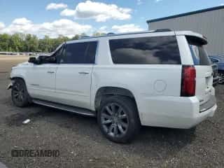 2019 Chevrolet Suburban Premier with VIN 1GNSKJKC9KR396466, listed as a Copart auction lot 70675495 with 128,532 mi miles and Salvage title. Bid and sale history available at DreamBid. Image 2.