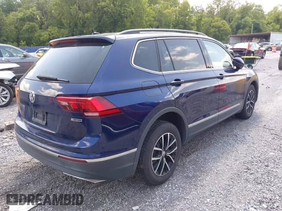 2021 Volkswagen Tiguan SE с VIN 3VV2B7AX8MM056411, выставлен на аукционе IAAI как лот 42988314 с пробегом 93 989 миль миль и . История ставок и продаж доступна на DreamBid. Изображение 4.