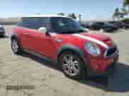 2011 MINI Hardtop S with VIN WMWSV3C50BTY12562, listed as a Copart auction lot 61183425 with 125,126 mi miles and Salvage title. Bid and sale history available at DreamBid. Image 4.