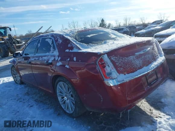 2014 Chrysler 300 C with VIN 2C3CCAET9EH104233, listed as a IAAI auction lot 41581466 with 127,772 mi miles and . Bid and sale history available at DreamBid. Image 3.