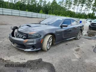 2022 Dodge Charger R/T with VIN 2C3CDXCT9NH235679, listed as a Copart auction lot 63443715 with 61,571 mi miles and Salvage title. Bid and sale history available at DreamBid. Image 1.