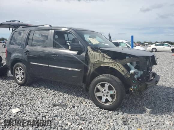 2011 Honda Pilot Touring с VIN 5FNYF3H9XBB029662, выставлен на аукционе Copart как лот 82096555 с пробегом 79 853 миль миль и Списание • Salvage title. История ставок и продаж доступна на DreamBid. Изображение 4.