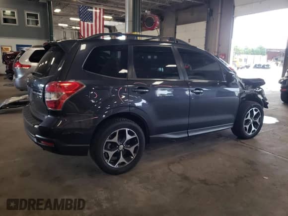 2015 Subaru Forester XT Premium with VIN JF2SJGDC4FH820418, listed as a Copart auction lot 65555425 with 112,791 mi miles and Salvage title. Bid and sale history available at DreamBid. Image 3.