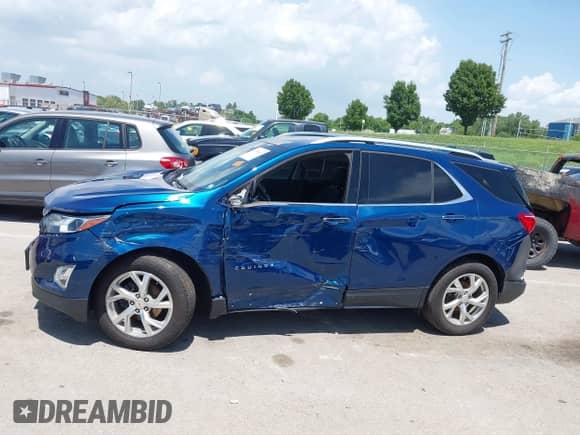 2020 Chevrolet Equinox Premier with VIN 2GNAXXEV3L6185614, listed as a IAAI auction lot 42798631 with 80,929 mi miles and . Bid and sale history available at DreamBid. Image 14.