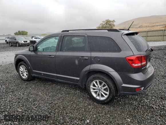 2015 Dodge Journey SXT with VIN 3C4PDCBG0FT718061, listed as a Copart auction lot 82205215 with 174,494 mi miles and Clean title. Bid and sale history available at DreamBid. Image 2.