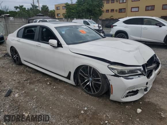 2016 BMW 7 Series 750i with VIN WBA7F0C51GGL99309, listed as a Copart auction lot 81058635 with Not provided miles and Salvage title. Bid and sale history available at DreamBid. Image 4.