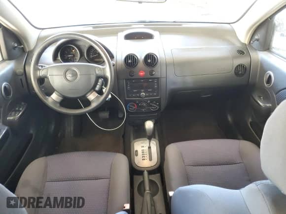 2007 Chevrolet Aveo LS z VIN KL1TD66607B717486, wystawiony jako Copart lot #81112554 z przebiegiem 96 318 mil mil oraz Szkoda całkowita • Salvage title. Historia ofert i sprzedaży dostępna na DreamBid. Obrazek 8.