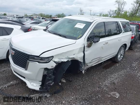 2021 Cadillac Escalade Premium Luxury z VIN 1GYS4CKL2MR216112, wystawiony jako IAAI lot #41956517 z przebiegiem 59 216 mil mil oraz . Historia ofert i sprzedaży dostępna na DreamBid. Obrazek 2.