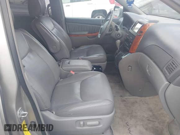 2009 Toyota Sienna XLE with VIN 5TDZK22C79S257834, listed as a IAAI auction lot 43212146 with 184,750 mi miles and . Bid and sale history available at DreamBid. Image 5.