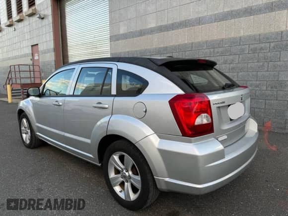 2010 Dodge Caliber SXT с VIN 1B3CB4HA1AD579409, выставлен на аукционе Copart как лот 91408935 с пробегом 100 311 миль миль и Чистый • Clean title. История ставок и продаж доступна на DreamBid. Изображение 3.
