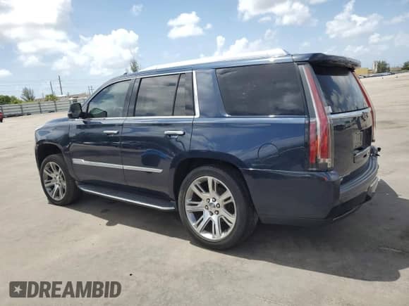 2018 Cadillac Escalade Luxury with VIN 1GYS3BKJ7JR260064, listed as a Copart auction lot 61089915 with 112,720 mi miles and Salvage title. Bid and sale history available at DreamBid. Image 2.