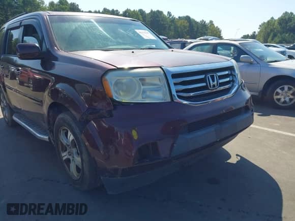 2014 Honda Pilot EX-L with VIN 5FNYF4H71EB001743, listed as a IAAI auction lot 43274349 with 251,219 mi miles and . Bid and sale history available at DreamBid. Image 6.