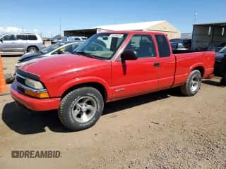 2003 Chevrolet S-10 LS with VIN 1GCCS19X038191048, listed as a Copart auction lot 80164935 with 103,558 mi miles and Salvage title. Bid and sale history available at DreamBid. Image 1.