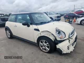 2013 MINI Hardtop with VIN WMWSU3C51DT678229, listed as a Copart auction lot 60745145 with 89,549 mi miles and Salvage title. Bid and sale history available at DreamBid. Image 4.