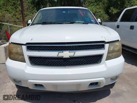 2007 Chevrolet Suburban LTZ with VIN 3GNFK16377G101075, listed as a IAAI auction lot 43025258 with Not provided miles and . Bid and sale history available at DreamBid. Image 12.