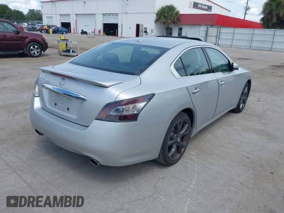 2014 Nissan Maxima S z VIN 1N4AA5APXEC444170, wystawiony jako IAAI lot #43251311 z przebiegiem 243 605 mil mil oraz . Historia ofert i sprzedaży dostępna na DreamBid. Obrazek 4.
