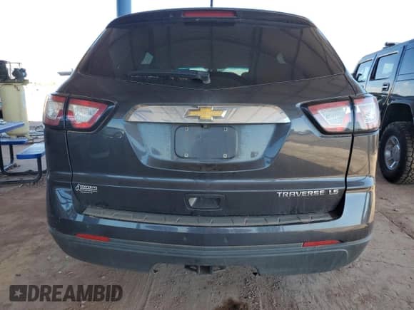 2016 Chevrolet Traverse LS z VIN 1GNKRFED3GJ236070, wystawiony jako Copart lot #70949835 z przebiegiem 130 601 mil mil oraz Szkoda całkowita • Salvage title. Historia ofert i sprzedaży dostępna na DreamBid. Obrazek 6.