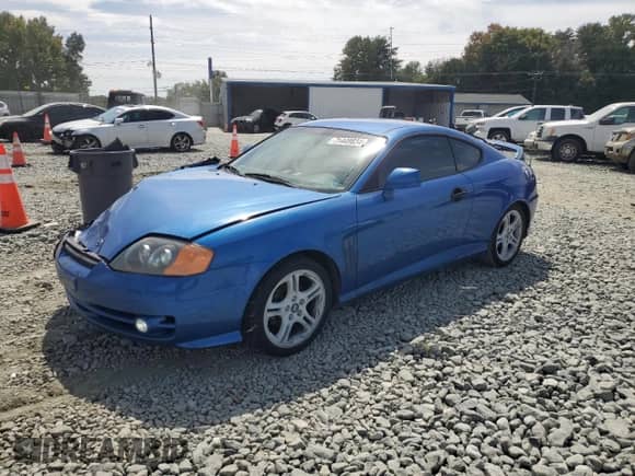 2004 Hyundai Tiburon GT с VIN KMHHN65F44U133018, выставлен на аукционе Copart как лот 71449834 с пробегом 142 777 миль миль и Списание • Salvage title. История ставок и продаж доступна на DreamBid. Изображение 1.