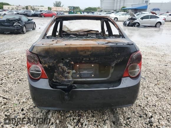 2013 Chevrolet Sonic LTZ с VIN 1G1JE5SHXD4169990, выставлен на аукционе Copart как лот 80101435 с пробегом Не указан миль и На запчасти • Non repairable. История ставок и продаж доступна на DreamBid. Изображение 6.