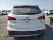 2014 Hyundai Santa Fe z VIN 5XYZUDLB4EG170105, wystawiony jako Copart lot #68638445 z przebiegiem 296 173 mil mil oraz Czysty tytuł • Clean title. Historia ofert i sprzedaży dostępna na DreamBid. Obrazek 6.