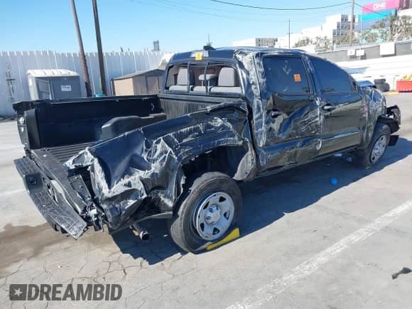 2022 Toyota Tacoma SR with VIN 3TYAX5GNXNT053716, listed as a IAAI auction lot 42853297 with 42,989 mi miles and . Bid and sale history available at DreamBid. Image 4.