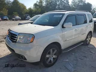 2014 Honda Pilot Touring z VIN 5FNYF3H94EB026728, wystawiony jako Copart lot #81442525 z przebiegiem 144 446 mil mil oraz Szkoda całkowita • Salvage title. Historia ofert i sprzedaży dostępna na DreamBid. Obrazek 1.