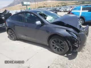 2023 Tesla Model Y Long Range with VIN 7SAYGAEE2PF961626, listed as a Copart auction lot 66751724 with Not provided miles and Salvage title. Bid and sale history available at DreamBid. Image 4.