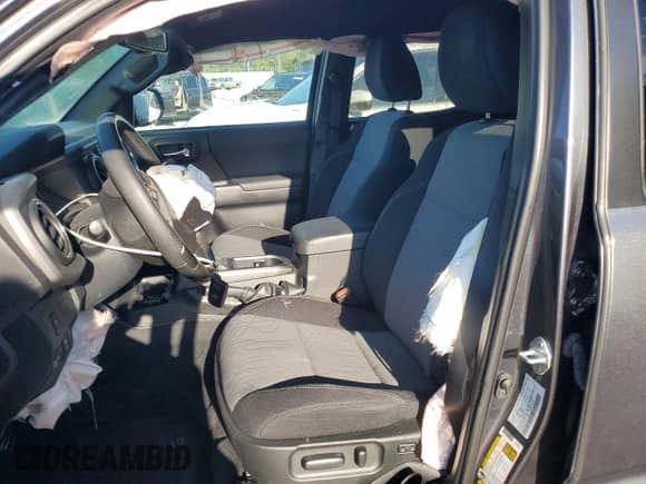 2021 Toyota Tacoma SR with VIN 3TMCZ5AN6MM394116, listed as a Copart auction lot 71531095 with 32,096 mi miles and Salvage title. Bid and sale history available at DreamBid. Image 7.