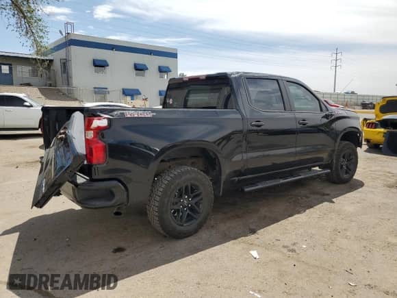 2024 Chevrolet Silverado 1500 Custom Trail Boss with VIN 3GCPDCEK8RG186393, listed as a Copart auction lot 53057895 with 26,915 mi miles and Salvage title. Bid and sale history available at DreamBid. Image 3.