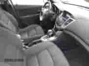 2014 Chevrolet Cruze 1LT with VIN 1G1PC5SB9E7445765, listed as a IAAI auction lot 43298770 with 131,052 mi miles and . Bid and sale history available at DreamBid. Image 5.