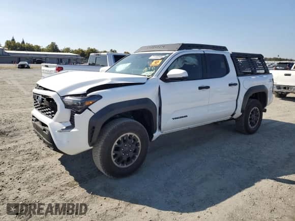 2024 Toyota Tacoma SR5 with VIN 3TMLB5JN4RM050957, listed as a Copart auction lot 71130595 with 1,873 mi miles and Salvage title. Bid and sale history available at DreamBid. Image 1.