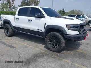 2022 Ram 1500 TRX with VIN 1C6SRFU97NN168472, listed as a IAAI auction lot 42160696 with 13,695 mi miles and . Bid and sale history available at DreamBid. Image 1.