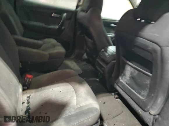 2016 Chevrolet Traverse LT z VIN 1GNKVHKD1GJ104744, wystawiony jako Copart lot #63876775 z przebiegiem Nie podano mil oraz Szkoda całkowita • Salvage title. Historia ofert i sprzedaży dostępna na DreamBid. Obrazek 10.