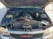 2000 GMC Sierra 1500 SLE with VIN 2GTEC19VXY1171355, listed as a Copart auction lot 67357465 with 340,576 mi miles and Salvage title. Bid and sale history available at DreamBid. Image 11.