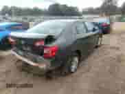 2014 Toyota Camry L with VIN 4T1BF1FK9EU848525, listed as a IAAI auction lot 43327119 with 163,899 mi miles and . Bid and sale history available at DreamBid. Image 4.